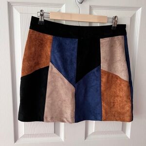Venus new without tags  patch faux suede skirt. Size M with zipper back